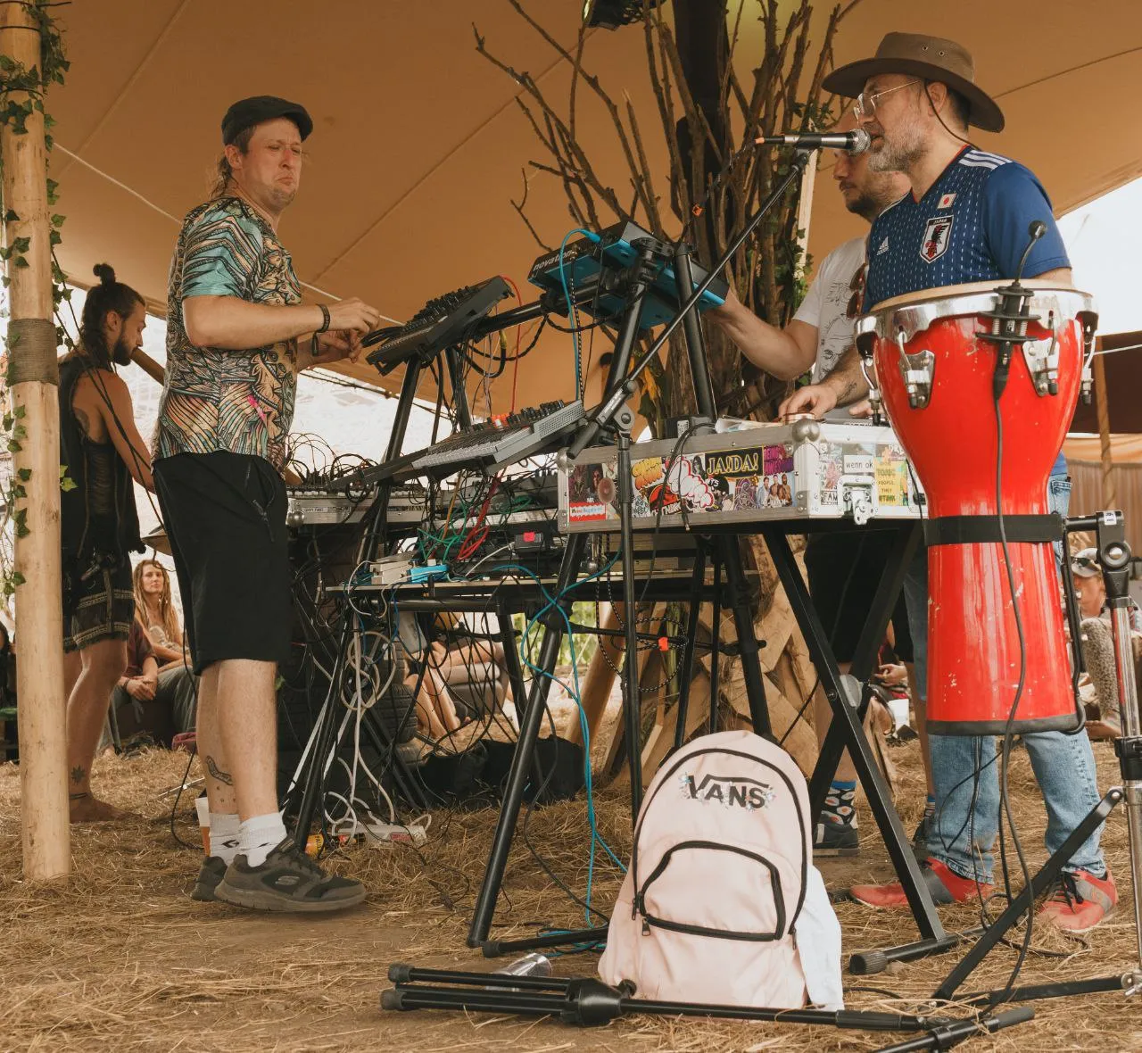 Synths, drum machines and a conga in a festival tent